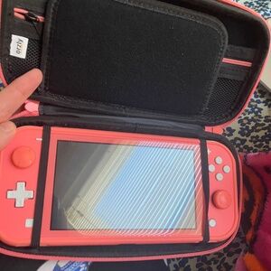 Coral Nintendo Switch + game